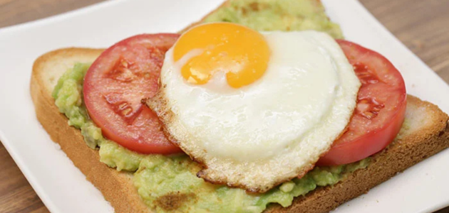 Egg sandwiches on toasted white toast with salad سندويشات البيض على خبز التوست الأبيض المحمص مع سلطه